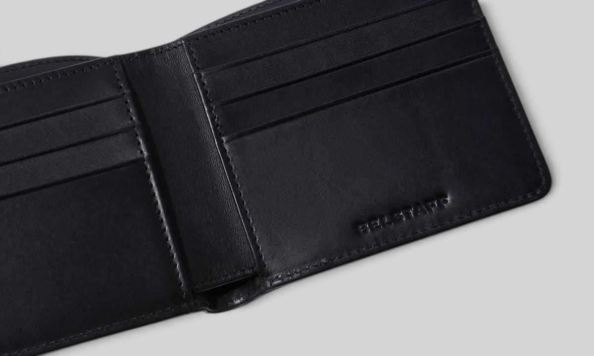 Baffle Haus Hanchurch black Italian leather bifold wallet with interior card slots and embossed logo detail.