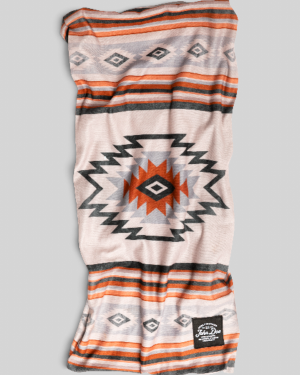 Baffle Haus John Doe Chicano neck tube in breathable Coolmax microfiber with a geometric orange and grey pattern