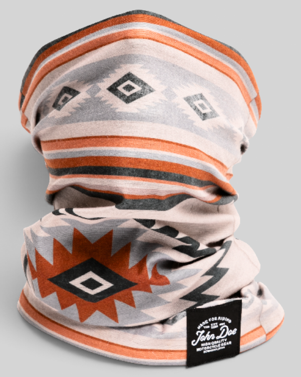 Baffle Haus John Doe Chicano neck tube in breathable Coolmax microfiber with a geometric orange and grey pattern.