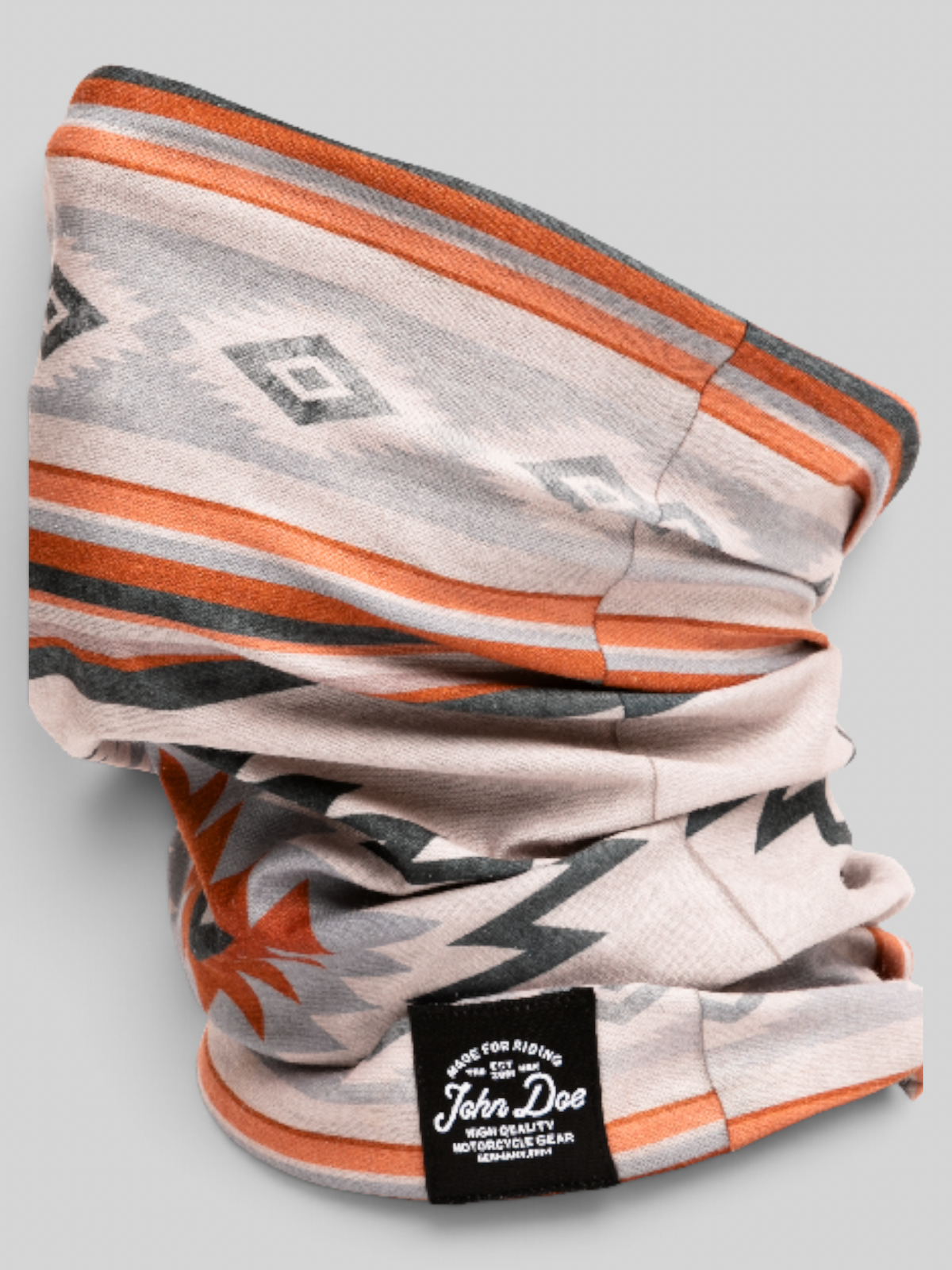 Baffle Haus John Doe Chicano neck tube in beige with orange and grey geometric patterns made from breathable microfiber