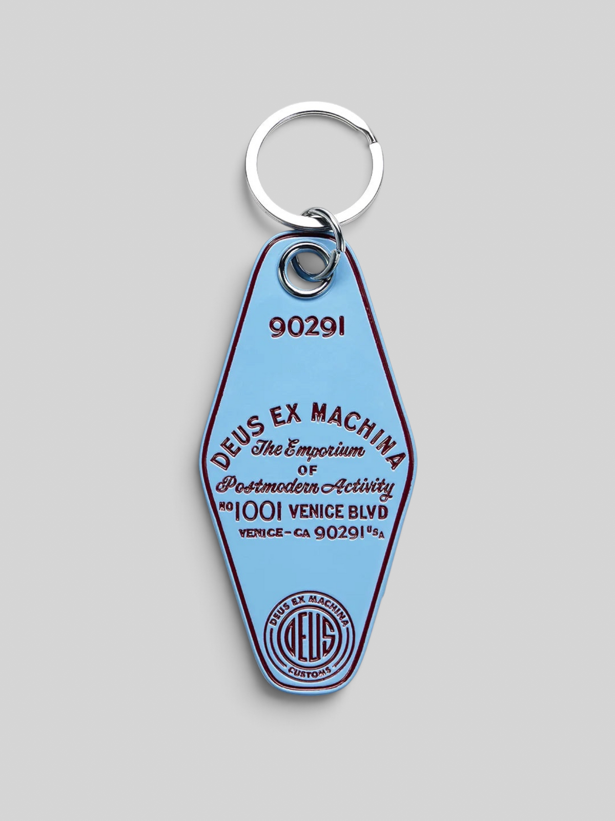 Baffle Haus Venice Key Tag in glacier blue enamel with maroon lettering and metal keyring attachment.