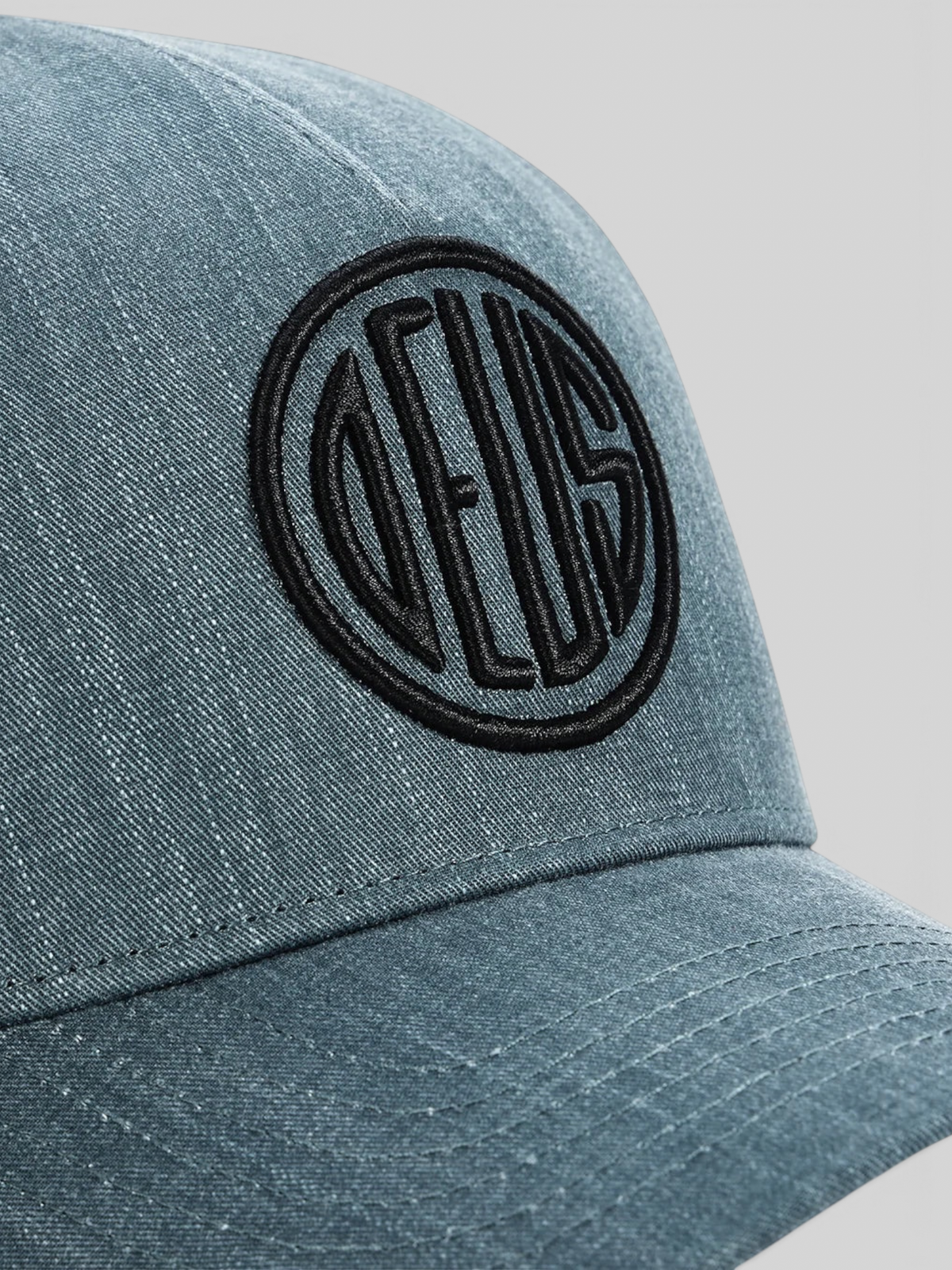 Baffle Haus Pill Deboss 5-panel cap in racing green cotton twill with high-density black embroidered logo detail