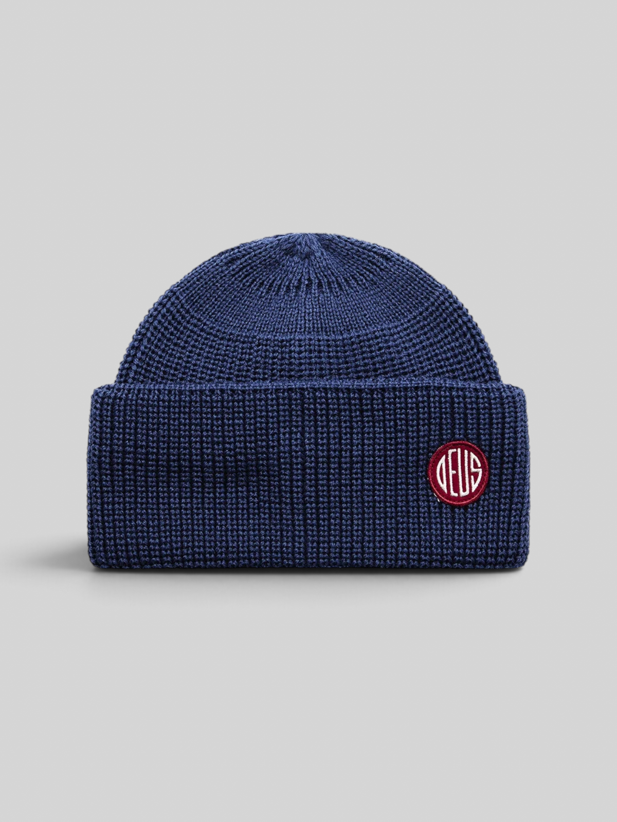 Baffle Haus Crosland beanie in mechanic blue wool with a double fold turnover and circular knit crown construction.
