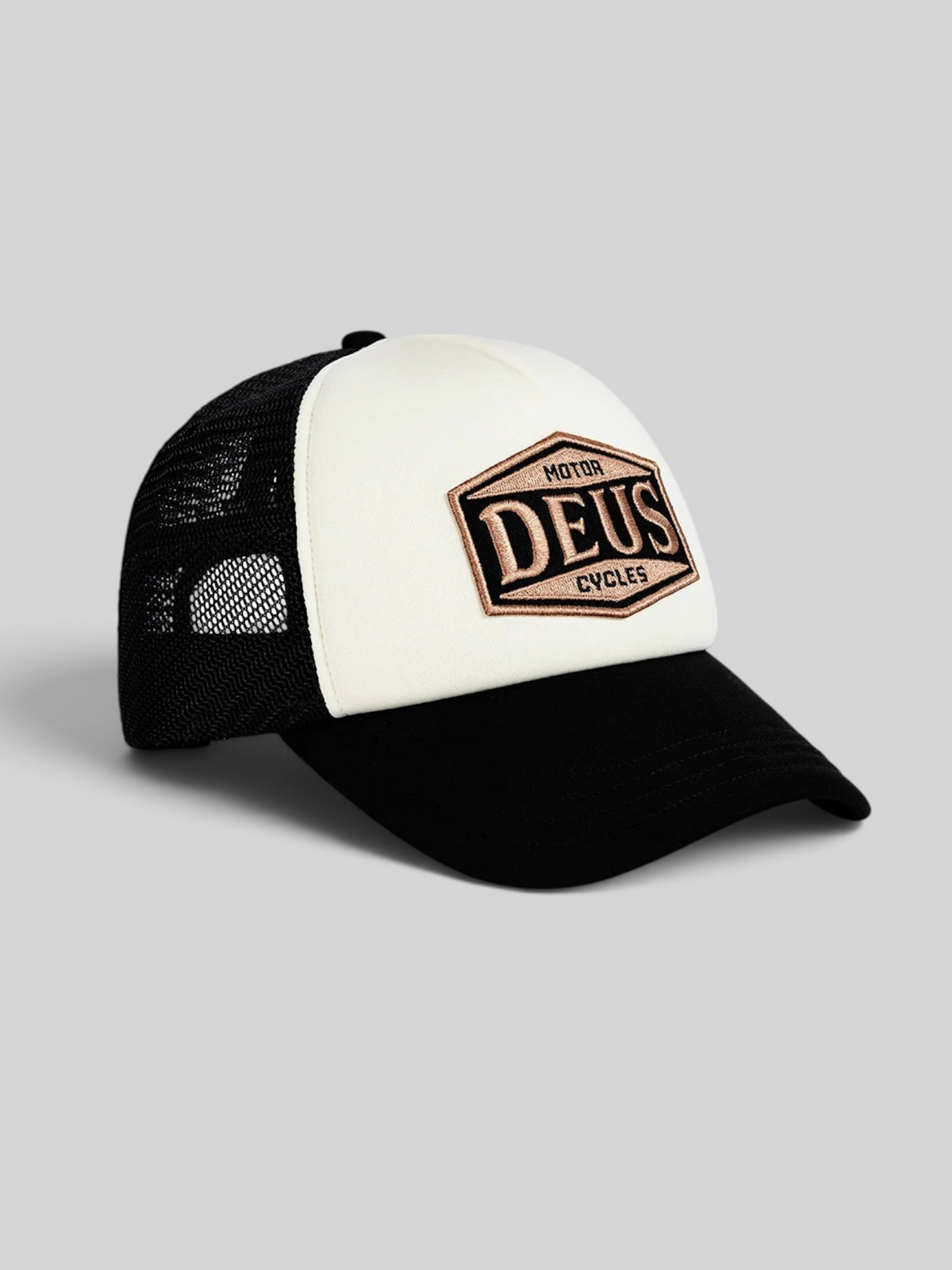 Baffle Haus Josel trucker hat in black and white with a vintage-style embroidered Deus Motor Cycles badge