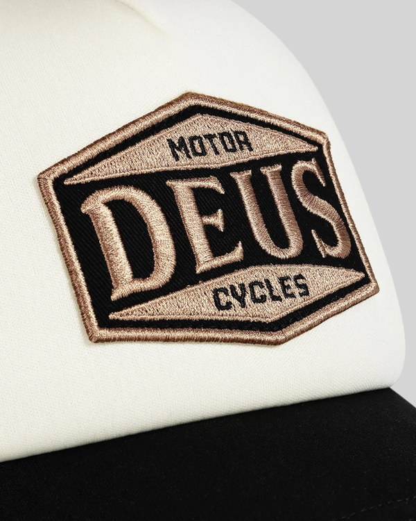 Baffle Haus Josel trucker hat in black and white featuring a detailed embroidered Deus Motor Cycles badge patch