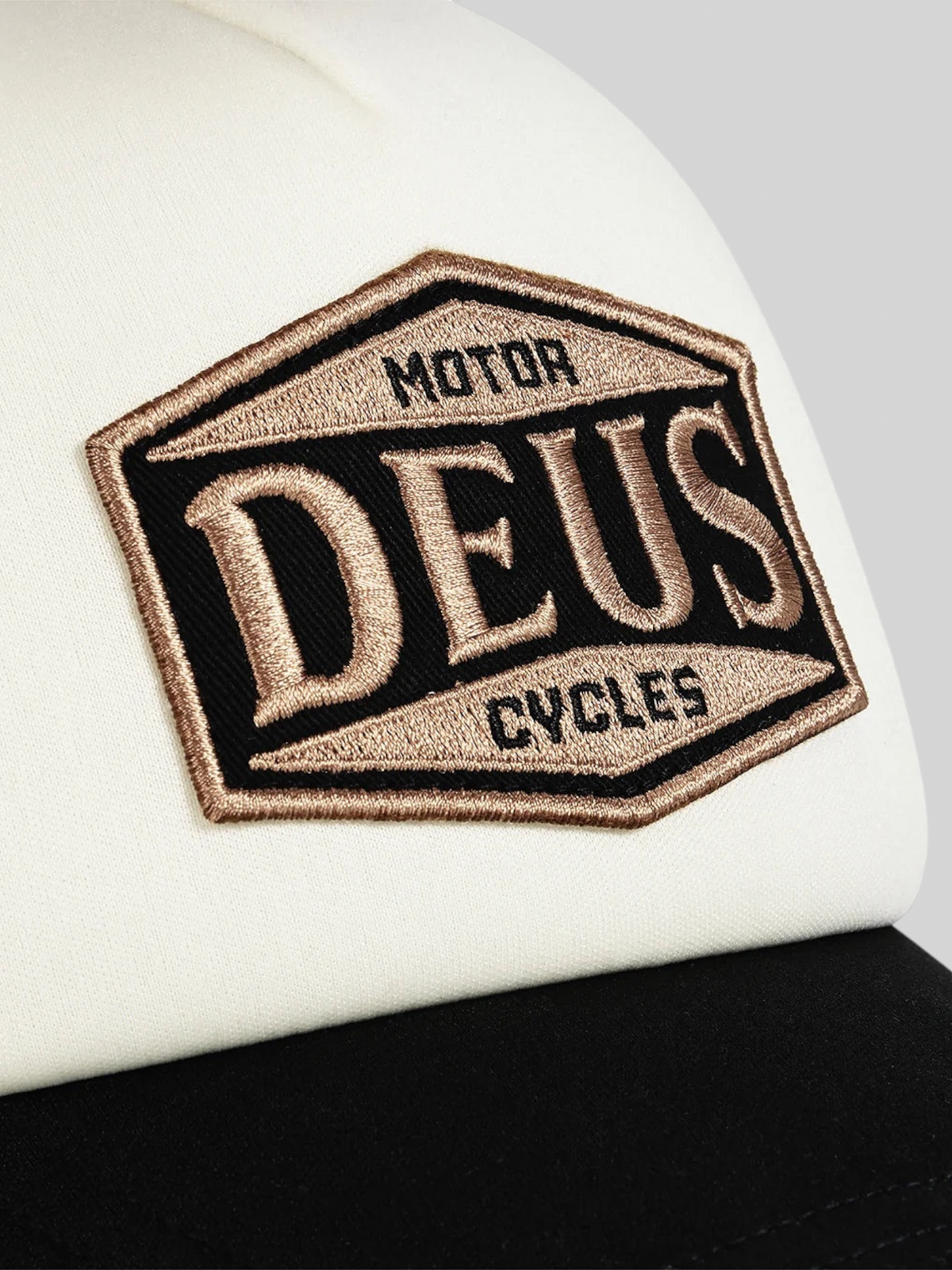 Baffle Haus Josel trucker hat in black and white featuring a detailed embroidered Deus Motor Cycles badge patch