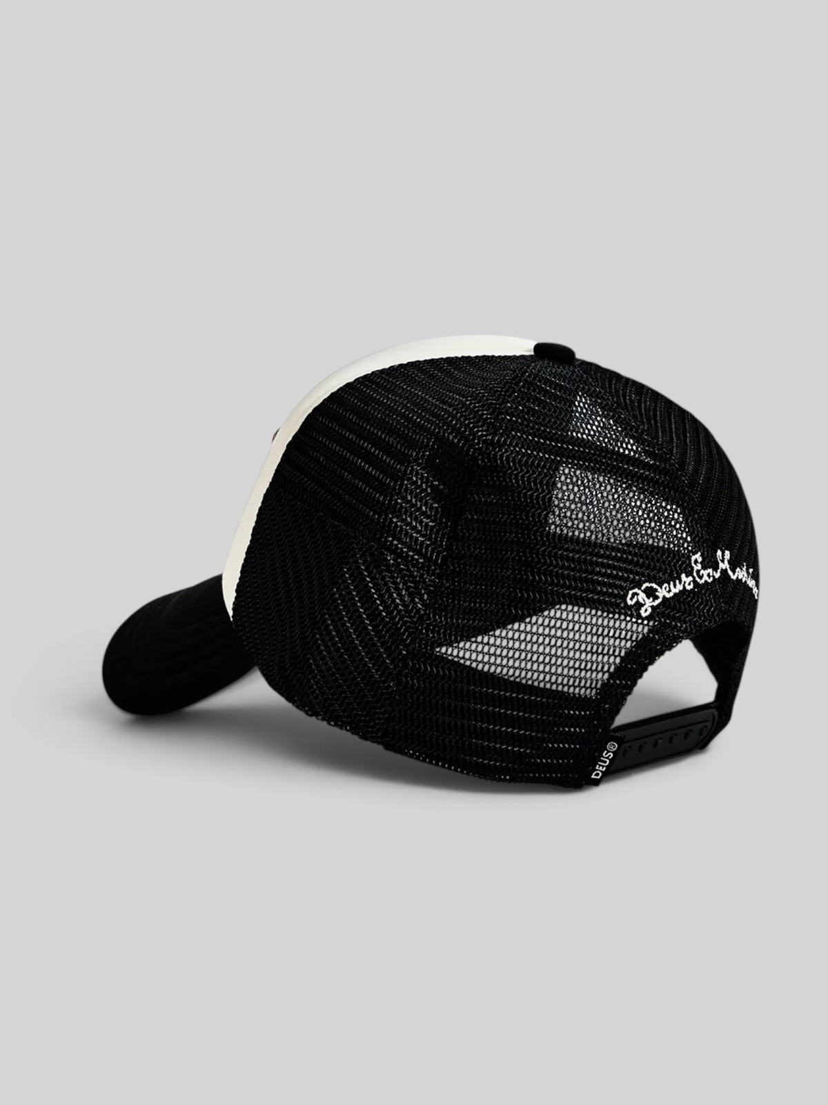 Baffle Haus Josel black and white 5-panel trucker hat with mesh back, snap adjuster, and embroidered side detail.