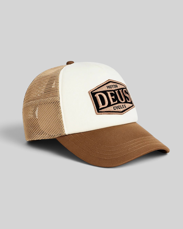 Baffle Haus Josel trucker hat in camel brown and white with a mesh back and embroidered Deus Motor Cycles badge.