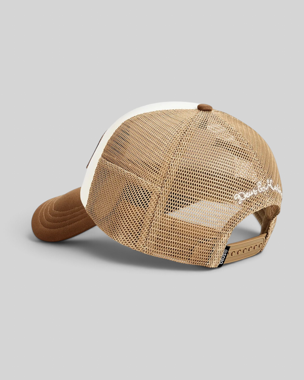 Baffle Haus Josel trucker hat in camel brown and white with mesh back, snap adjuster, and embroidered side detail.