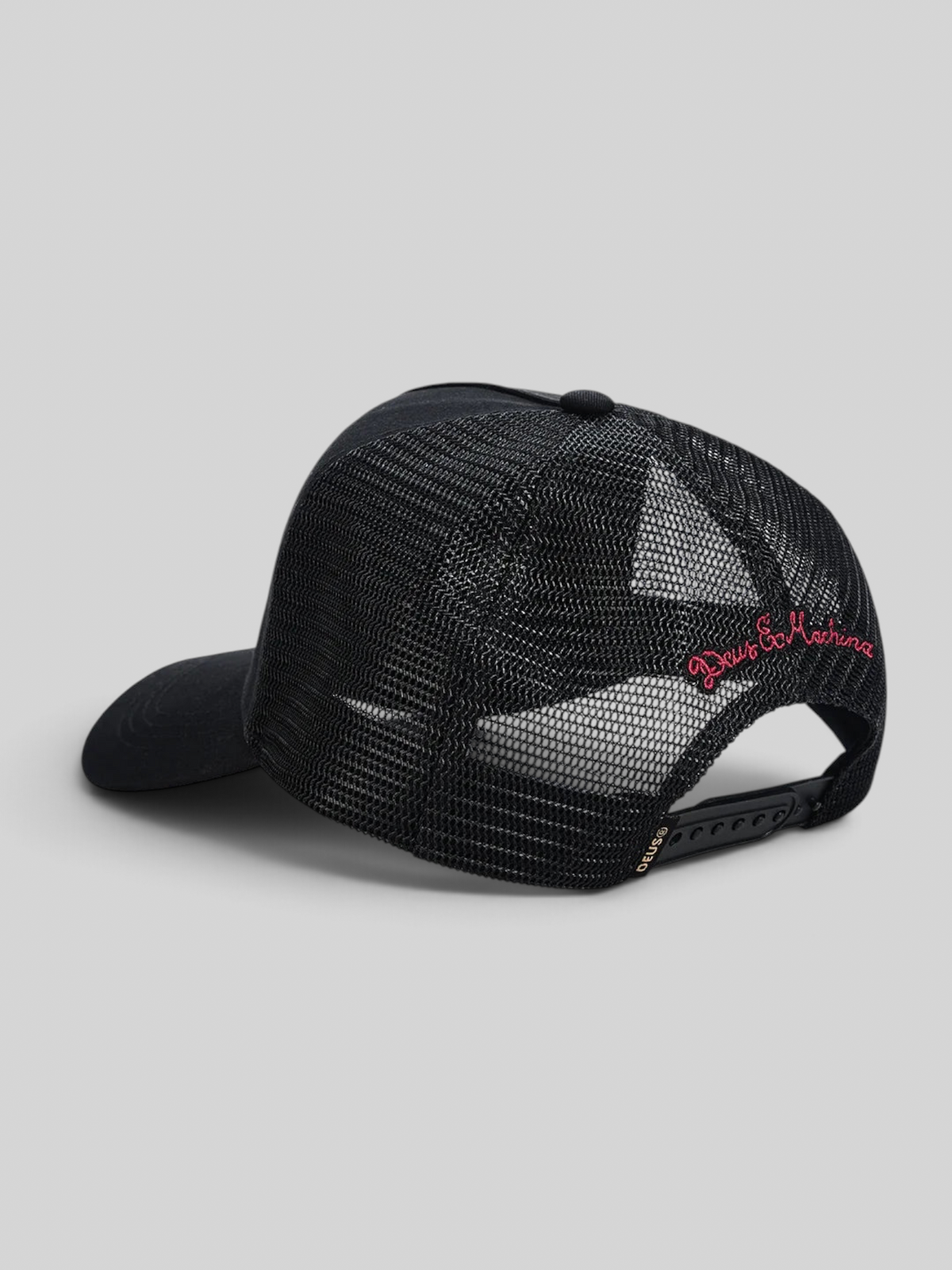 Baffle Haus Shook Ones black trucker hat with mesh back, plastic snap adjustment, and red embroidered side detail.