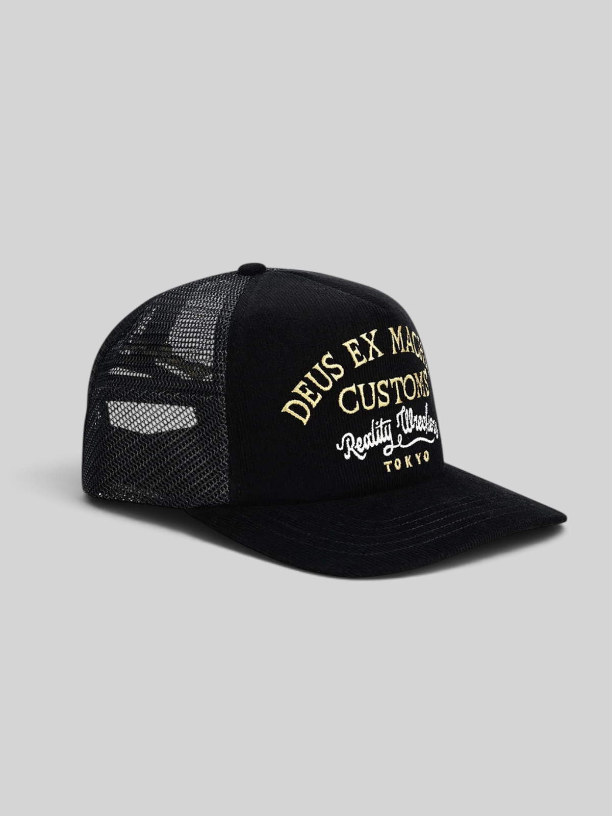 Baffle Haus Marsden Trucker cap in black corduroy with mesh back and gold embroidered front graphic