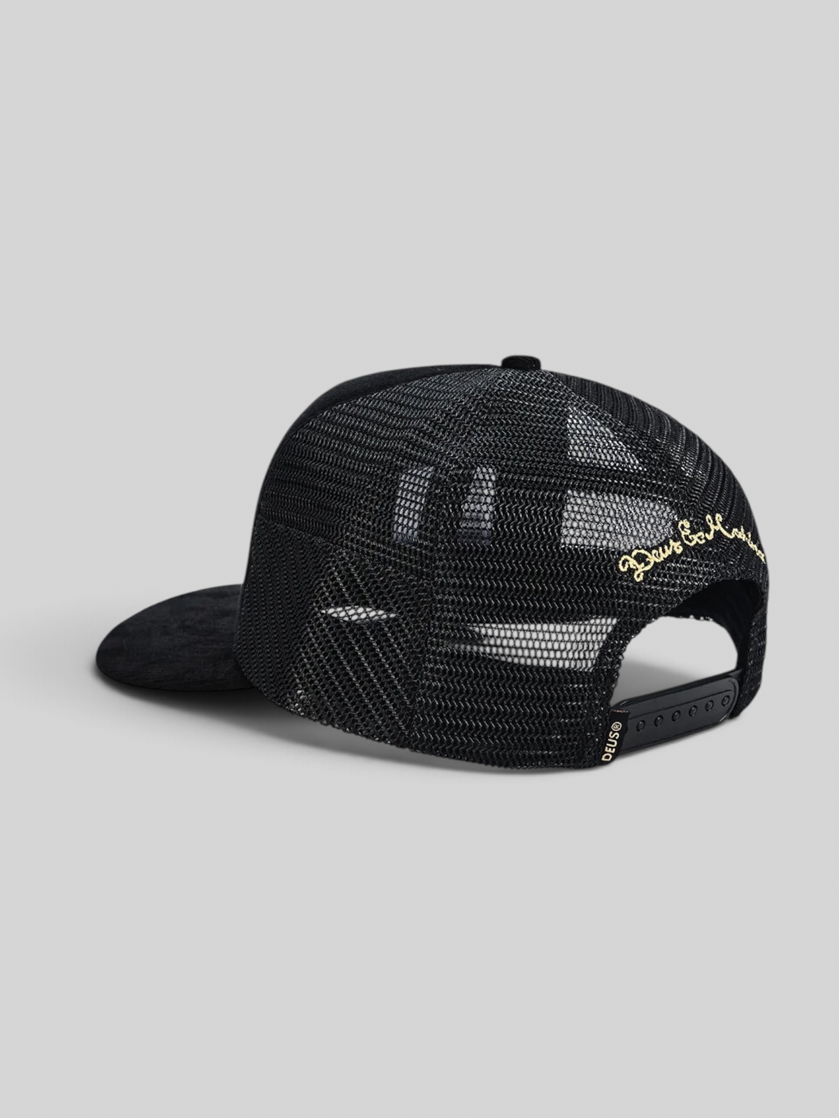 Baffle Haus Marsden Trucker cap in black featuring a mesh back, corduroy brim, and gold embroidered rear detail.
