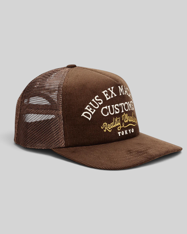 Baffle Haus Marsden brown corduroy trucker cap with white and gold embroidered front graphic and mesh back panels