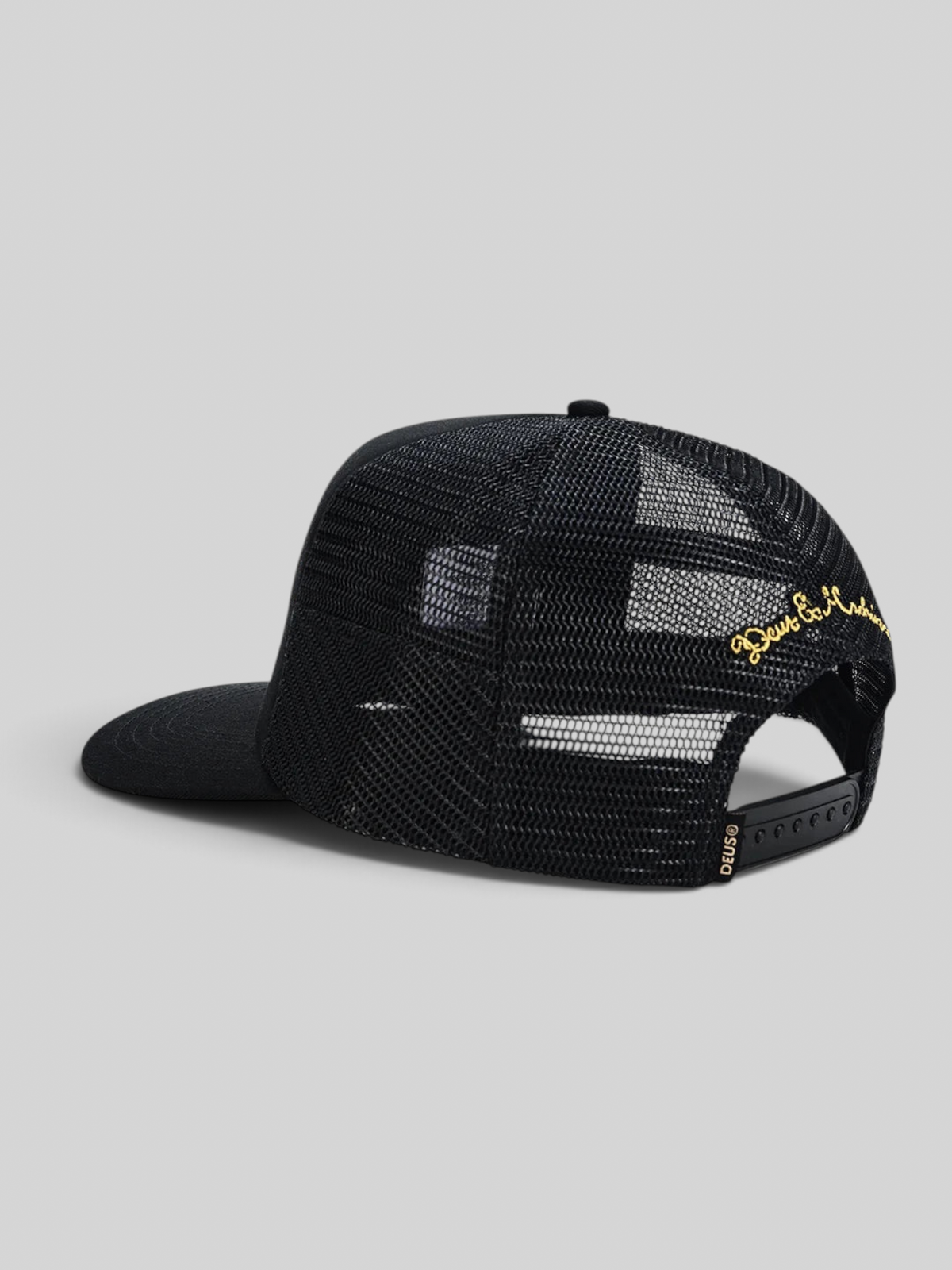 Baffle Haus Welcome Trucker cap in black with mesh back, snapback closure, and gold embroidered detail