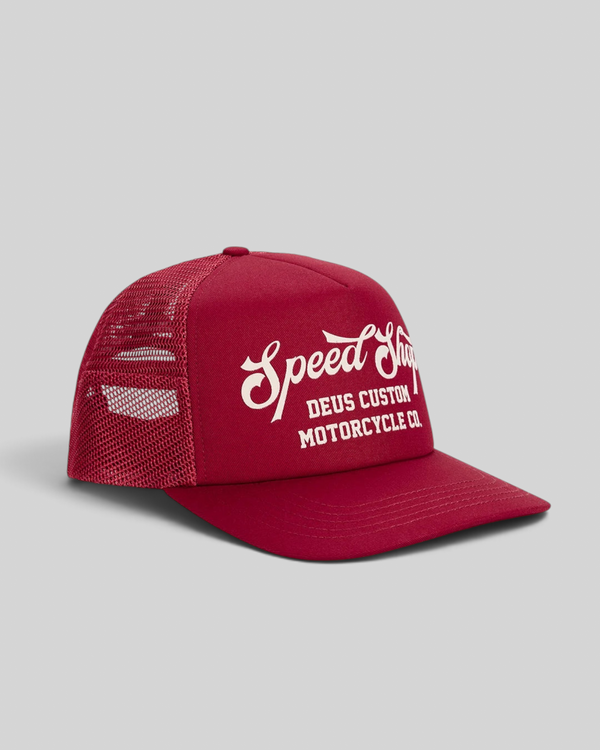 Baffle Haus cherry red 5-panel trucker cap with white flocked Speed Shop graphic and breathable mesh back
