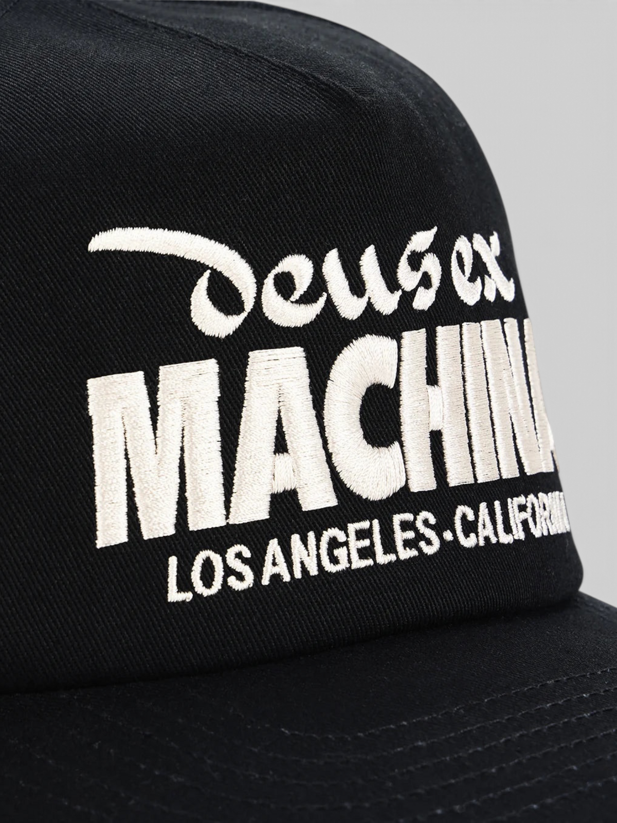 Baffle Haus Primo Cap in black cotton twill featuring white embroidered logo detail on the front panel.
