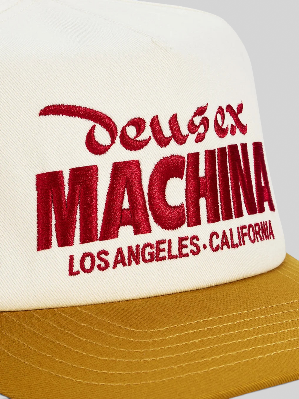 Baffle Haus Primo Cap in radiant yellow and cream cotton twill with red embroidered Deus Ex Machina front logo