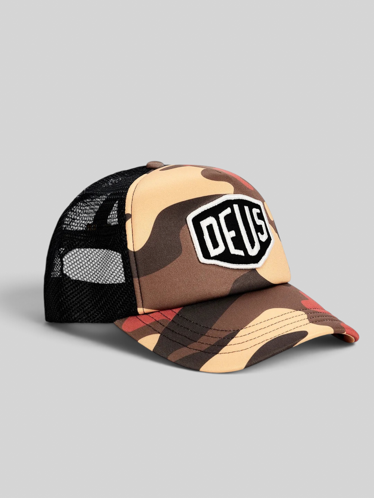 Baffle Haus Ombre Shield trucker cap in rust camo print with black mesh back and front embroidered logo badge