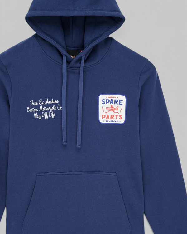 Baffle Haus Mudflap Hoodie in mechanic blue organic cotton fleece with chest embroidery and kangaroo pocket