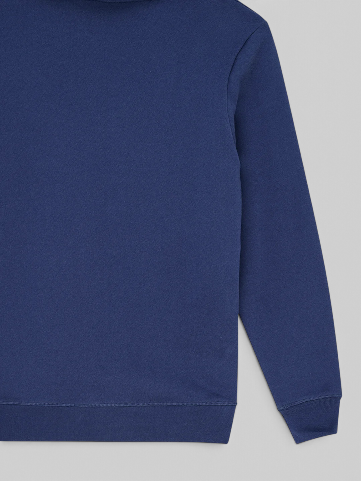 Baffle Haus Mudflap Hoodie in mechanic blue organic cotton fleece with ribbed cuffs and a boxy fit