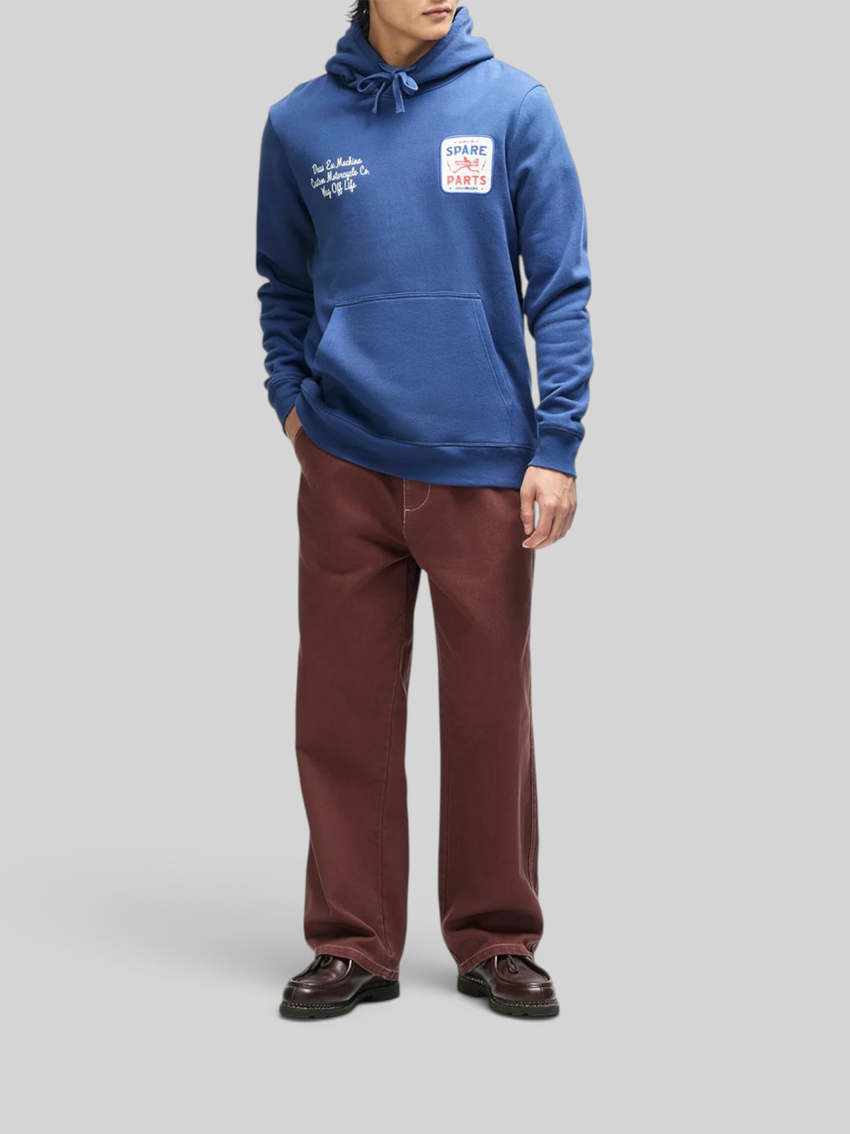 Baffle Haus Mudflap Hoodie in mechanic blue organic cotton fleece with chest embroidery and kangaroo pocket