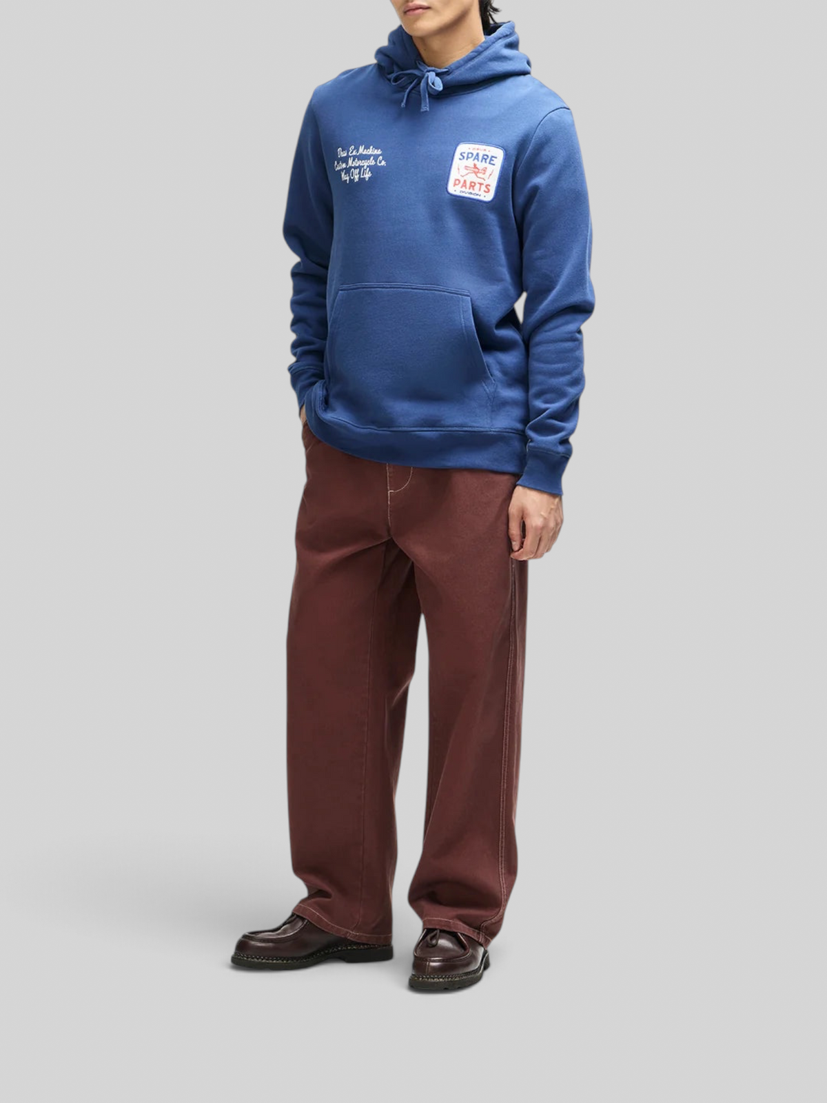 Baffle Haus Mudflap Hoodie in mechanic blue organic cotton fleece with chest embroidery and kangaroo pocket