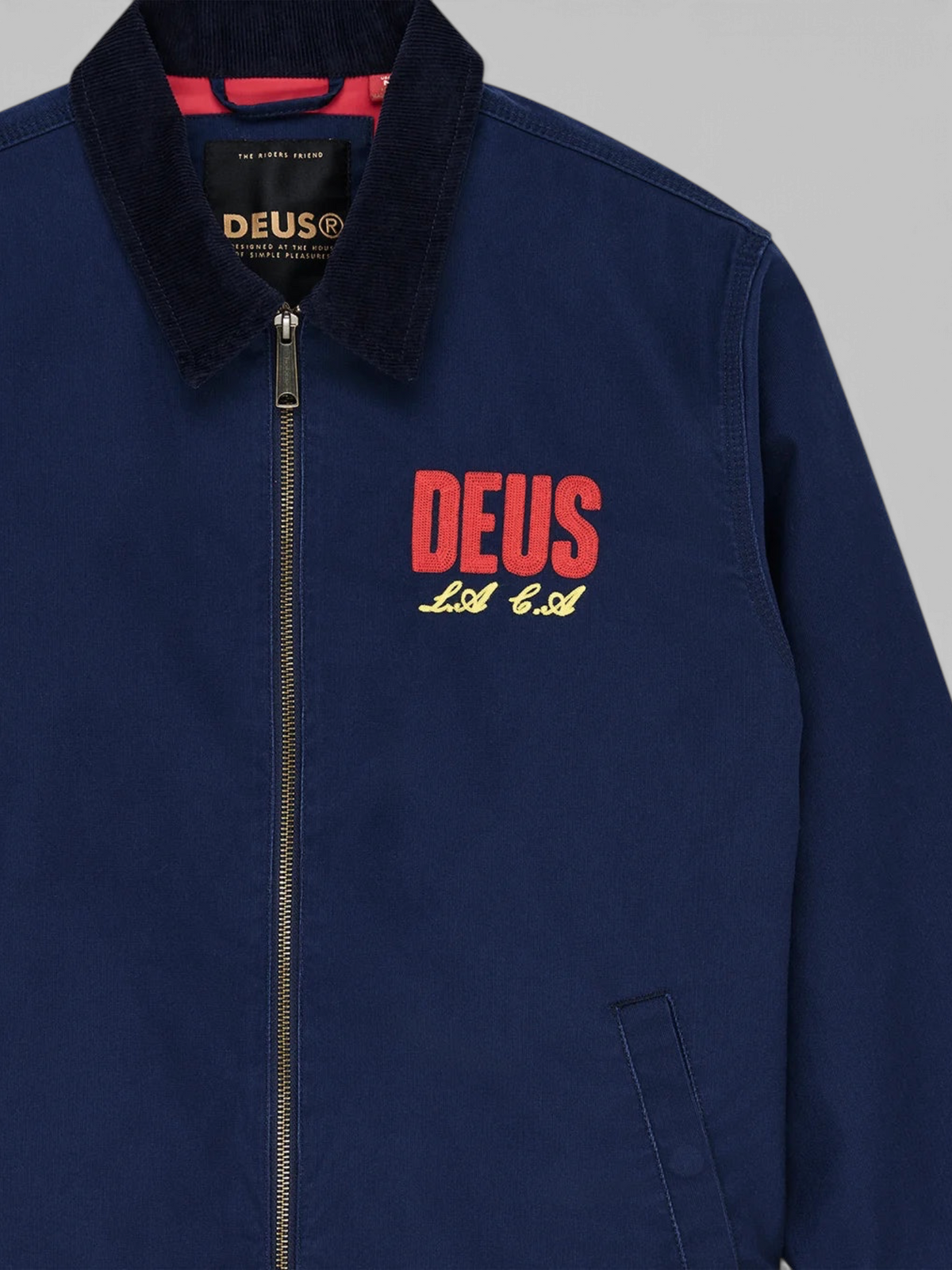 Baffle Haus navy cotton whipcord jacket with corduroy collar and red and yellow embroidered chest logo