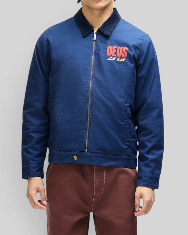 Baffle Haus navy cotton whipcord cutaway jacket with zip front, corduroy collar, and embroidered chest logo