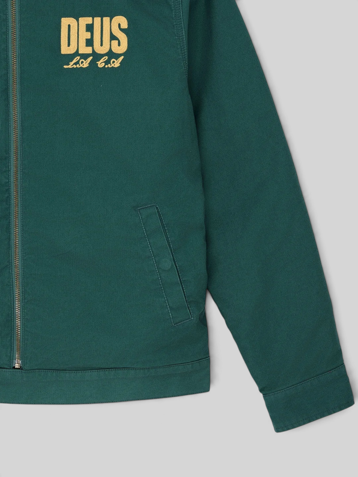 Baffle Haus racing green cotton whipcord zip-up jacket with embroidered chest logo and welt pockets