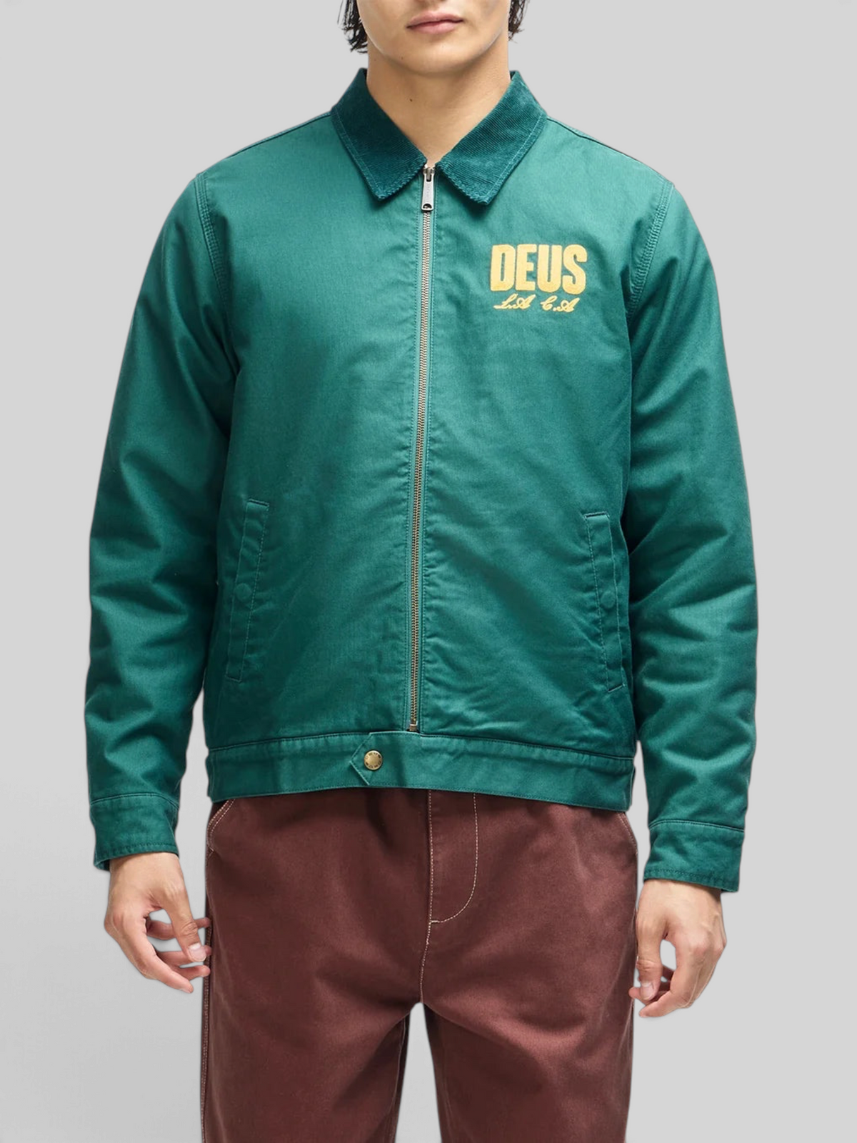 Baffle Haus racing green cotton whipcord cutaway jacket with zip front, collar, and embroidered chest logo