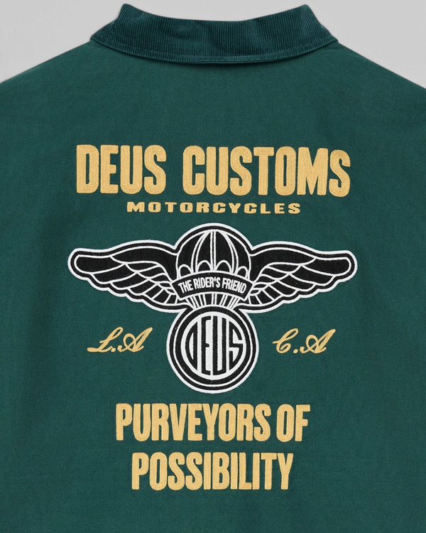 Baffle Haus racing green cotton whipcord jacket back view with embroidered motorcycle graphic and lettering