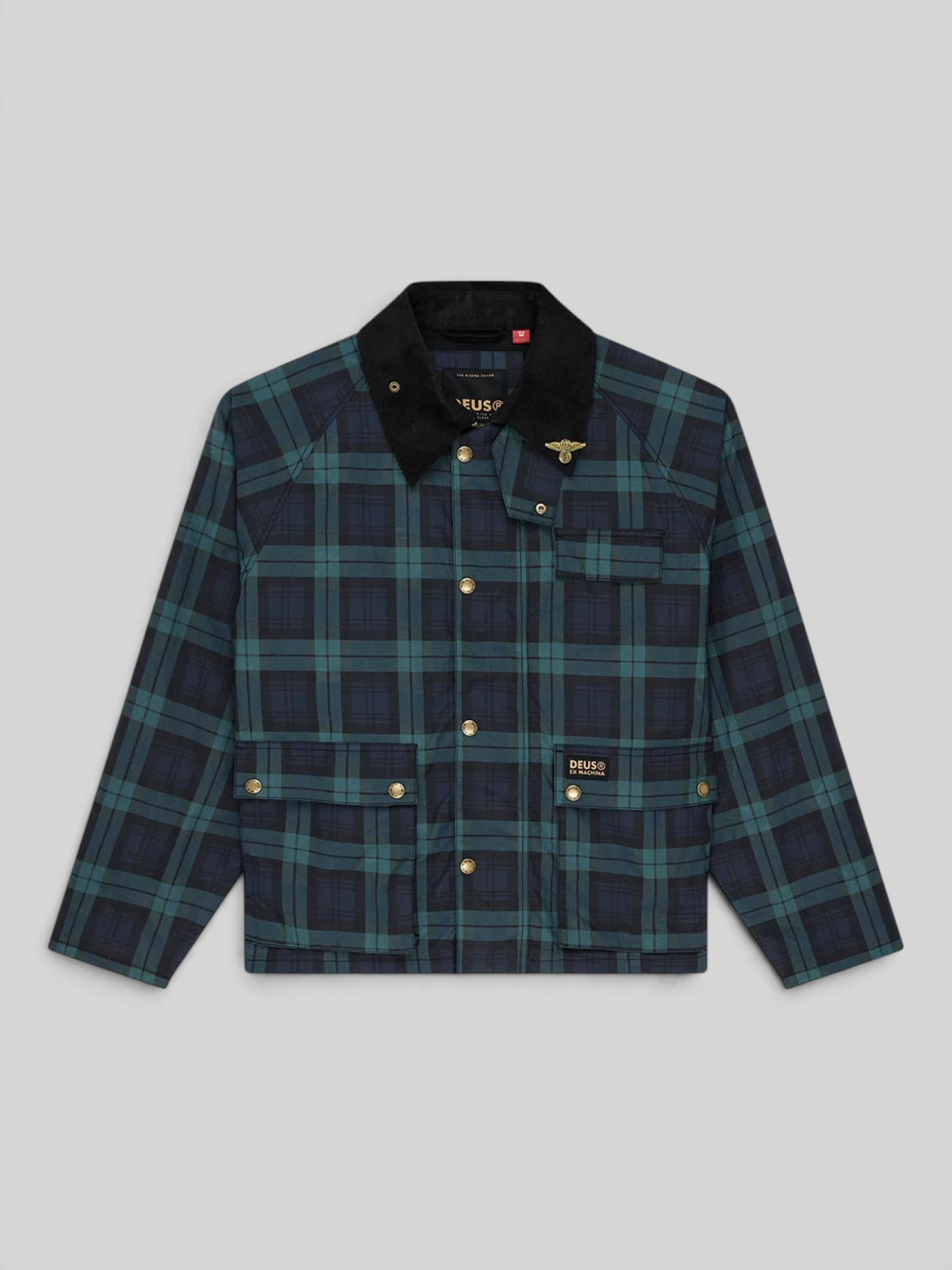 Baffle Haus Marsden hunting jacket in green check with a black corduroy collar, chest pocket, and brass snap buttons.