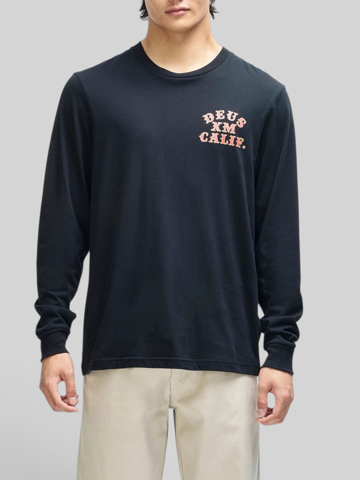 Baffle Haus Quick Strike long sleeve black cotton tee with chest graphic print worn by a model