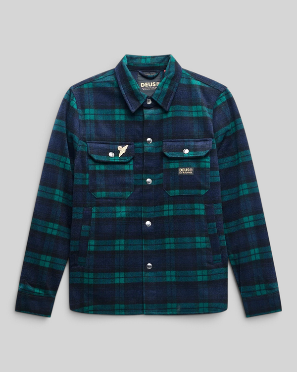 Baffle Haus Maxwell green and navy check wool-blend shirt with snap buttons, chest pockets, and metal pin detail.