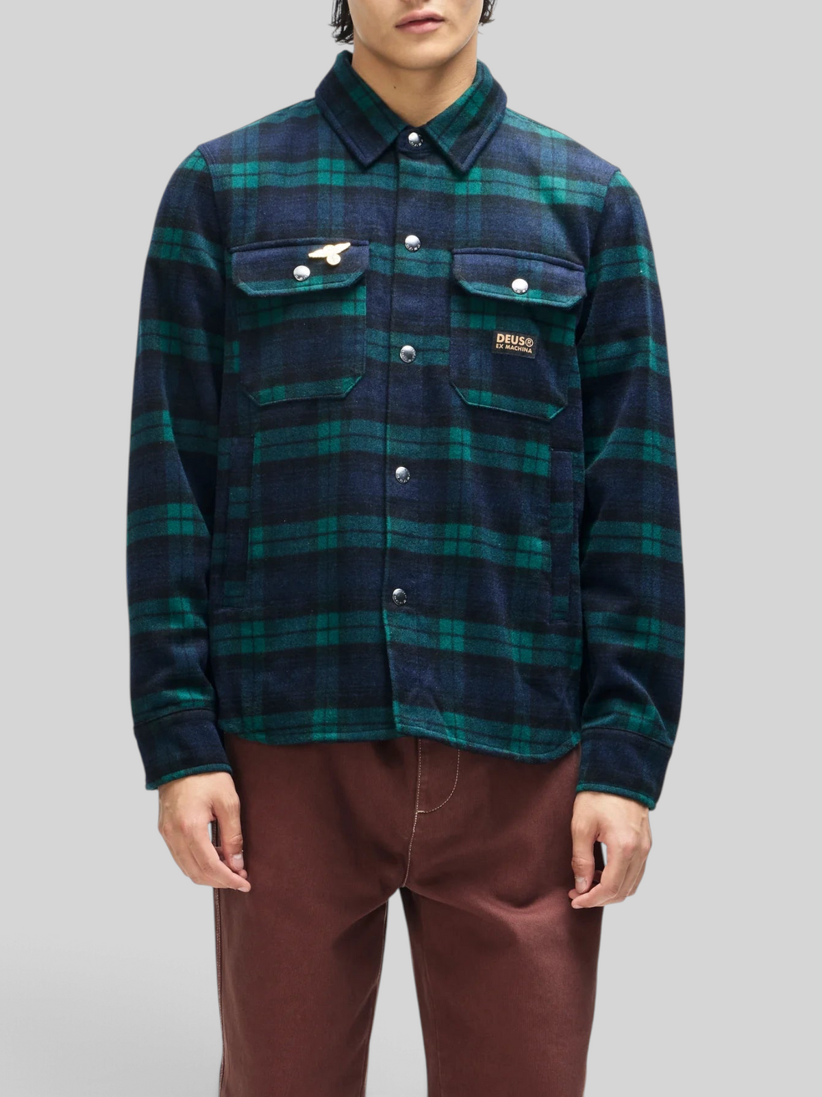 Baffle Haus Maxwell green and navy check wool blend shirt with chest pockets, snap buttons, and embroidered art pin.