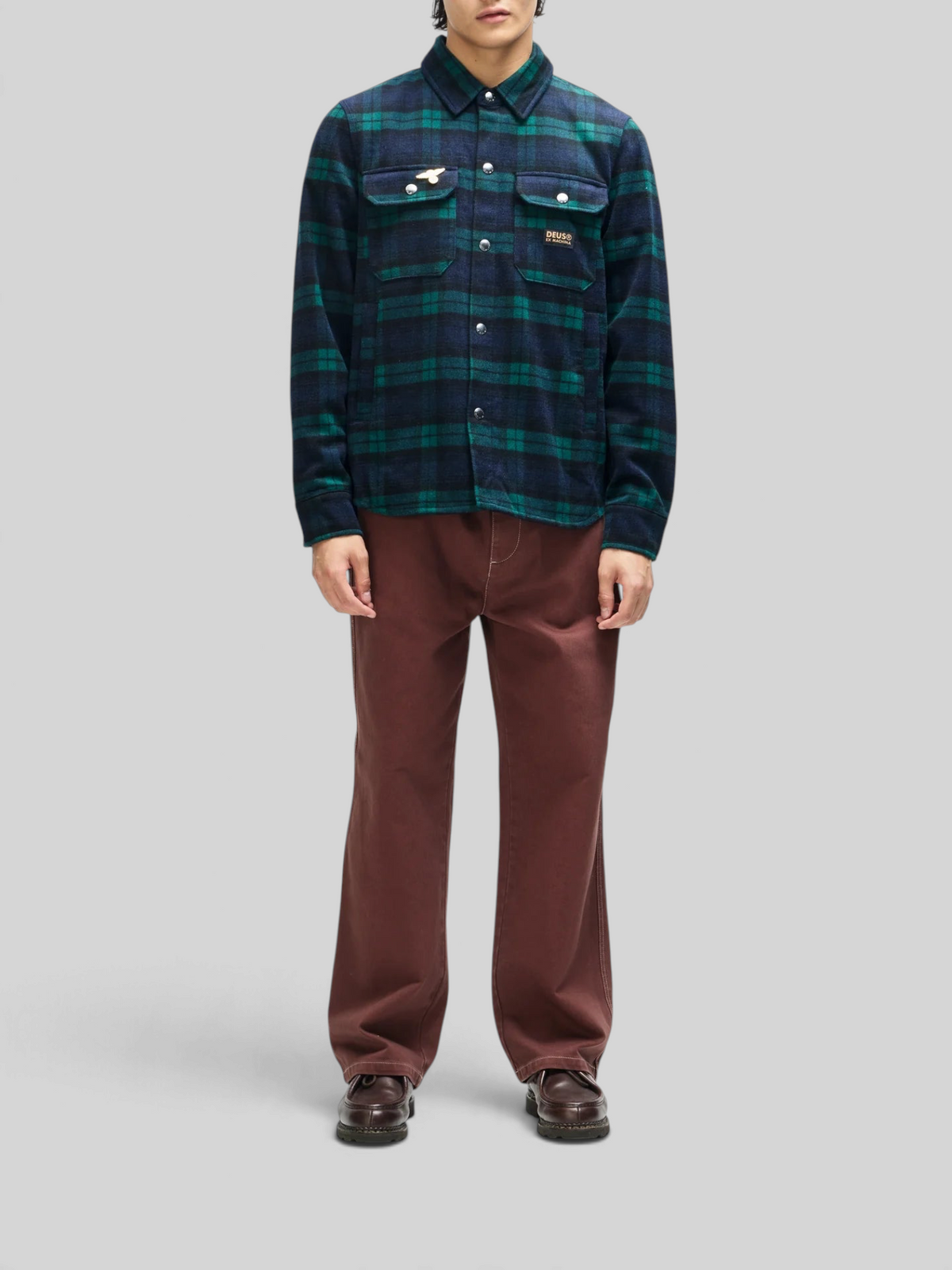 Baffle Haus Maxwell check shirt in green wool blend with chest pockets and snap buttons worn by a model