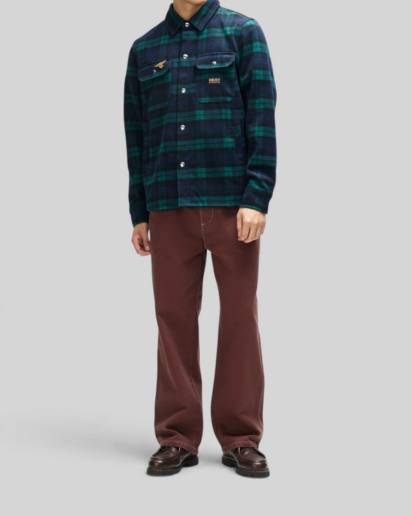 Baffle Haus Maxwell green check wool-blend shirt with snap buttons, chest pockets, and embroidered pin detail