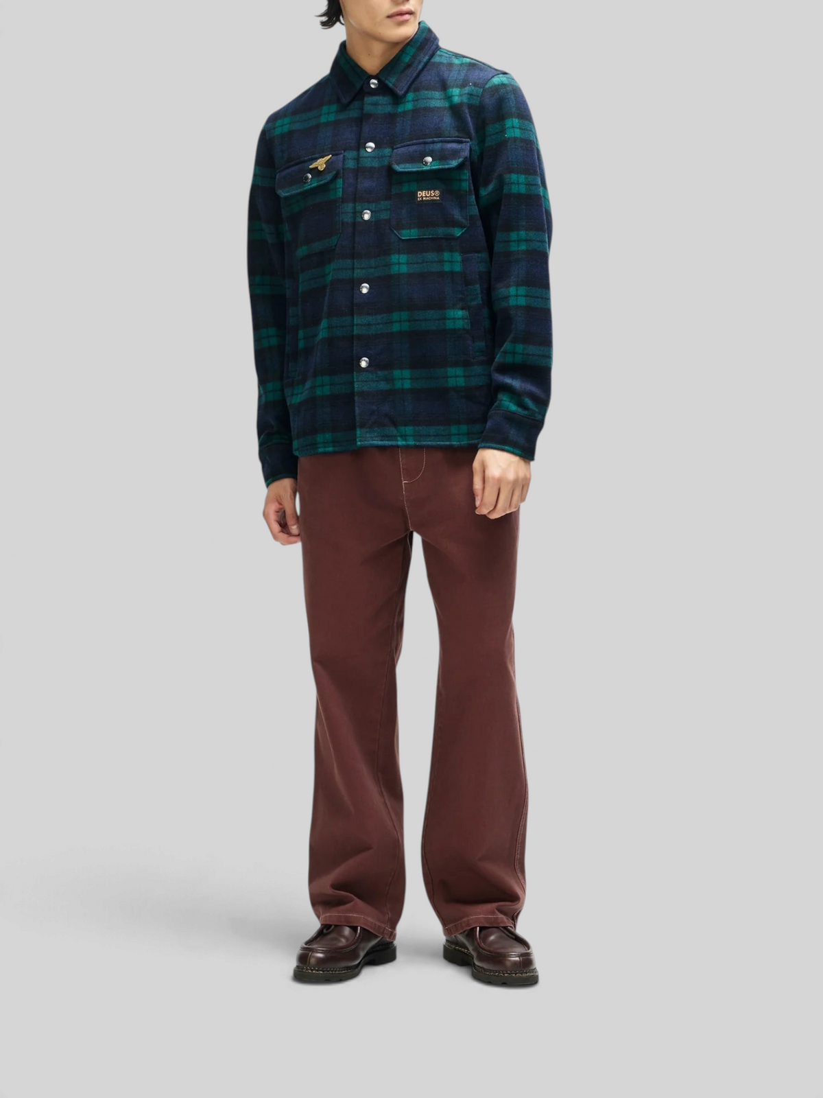 Baffle Haus Maxwell green check wool-blend shirt with snap buttons, chest pockets, and embroidered pin detail