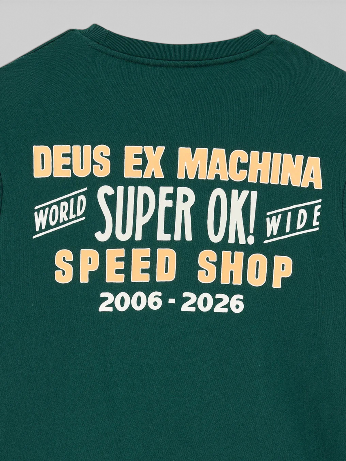 Baffle Haus Chessboxin Crew sweatshirt in racing green with vintage-style cream and orange graphic print on back