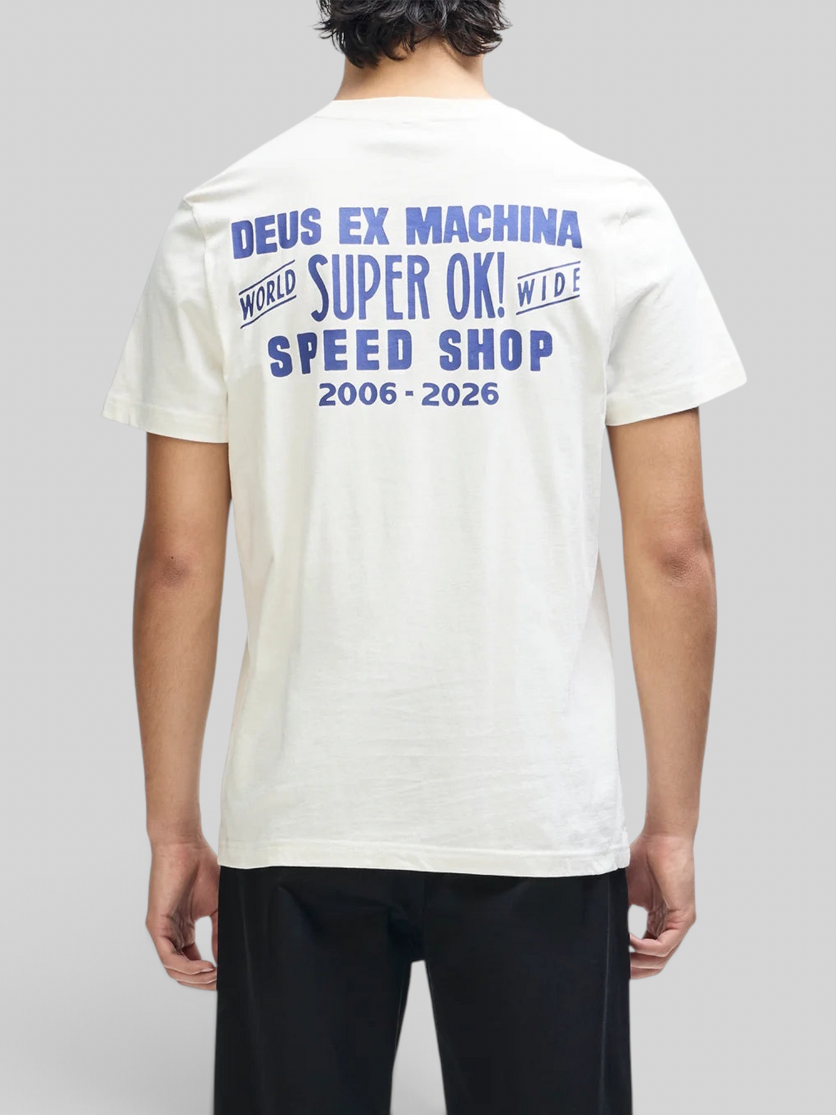 Baffle Haus Mudflap Tee in vintage white organic cotton with blue graphic print on the back, box fit style.
