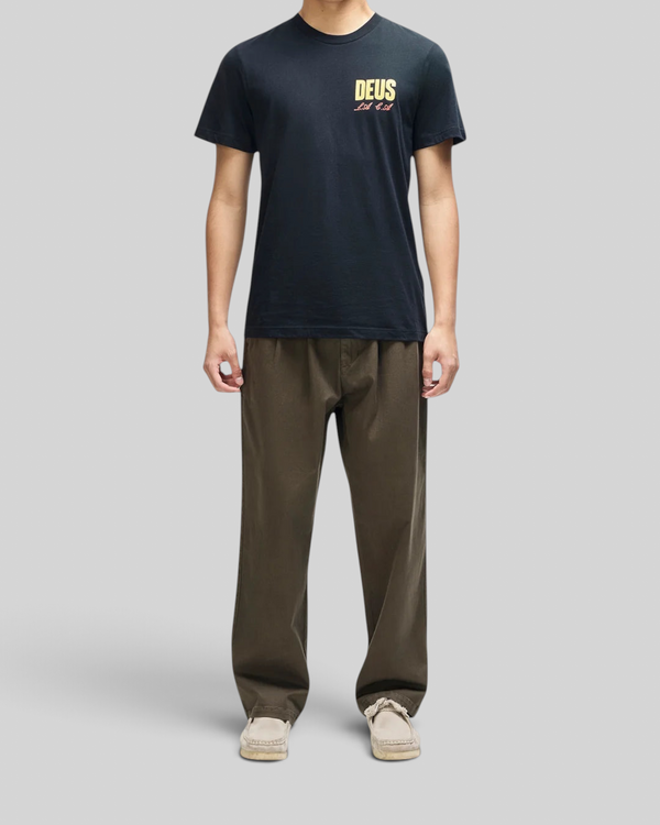 Baffle Haus black box fit organic cotton t-shirt with yellow chest graphic worn by a male model