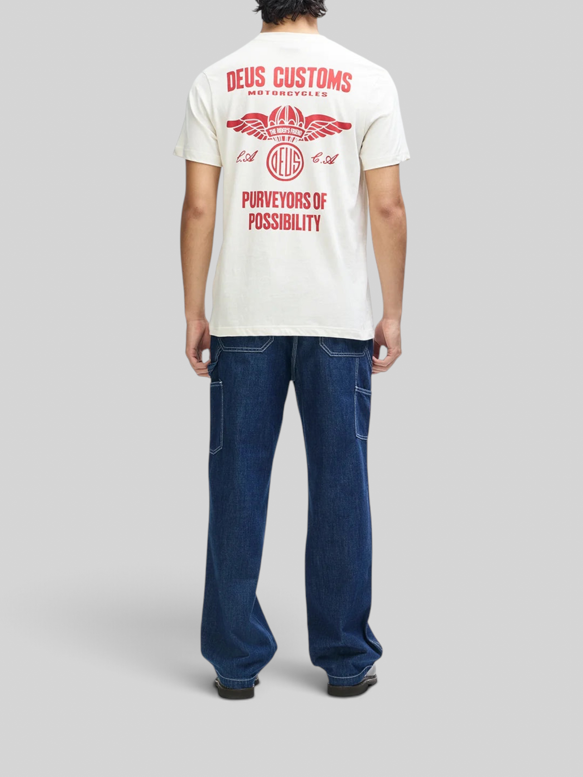Baffle Haus vintage white organic cotton box fit tee with red motorcycle graphic print on back worn by a man