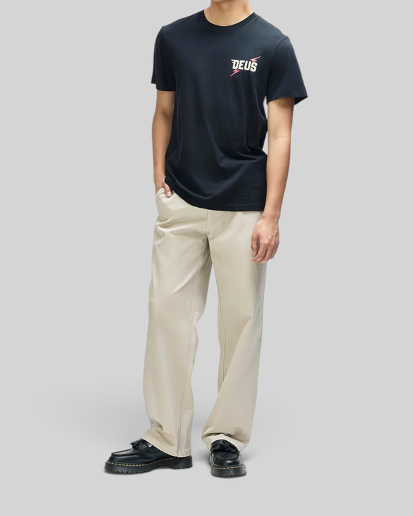 Baffle Haus Global Spark black box fit organic cotton t-shirt with chest graphic worn by a model