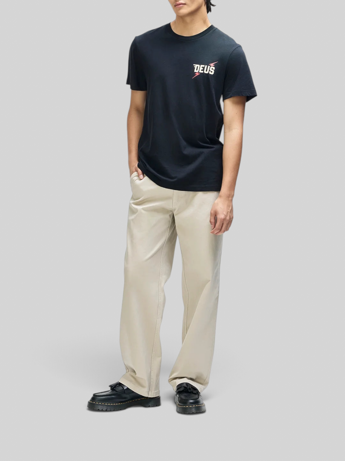 Baffle Haus Global Spark black box fit organic cotton t-shirt with chest graphic worn by a model