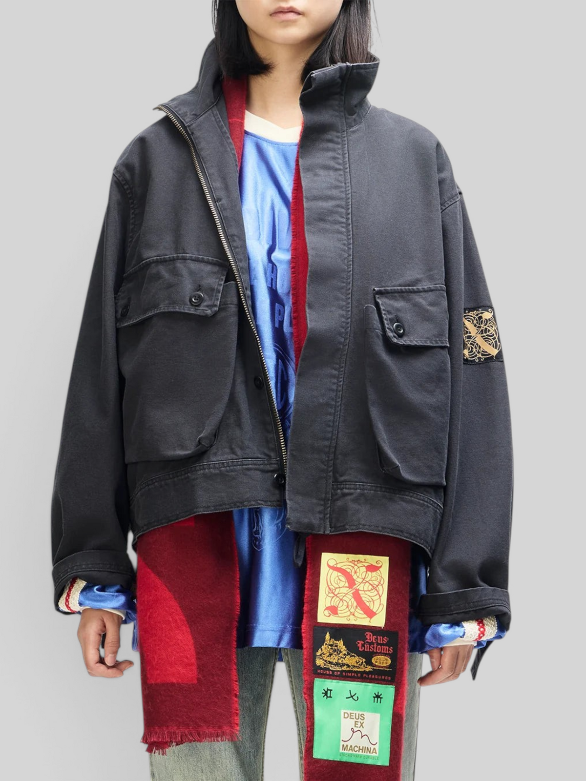 Baffle Haus Common State jacket in overdyed anthracite grey cotton canvas with large pockets and graphic sleeve label