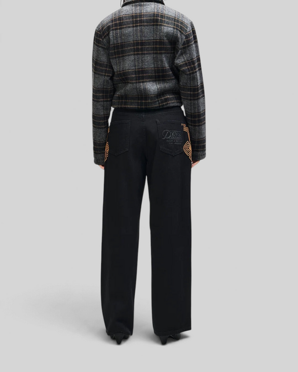 Baffle Haus Lost World wool blend bomber in phantom grey check worn with black embroidered trousers, back view