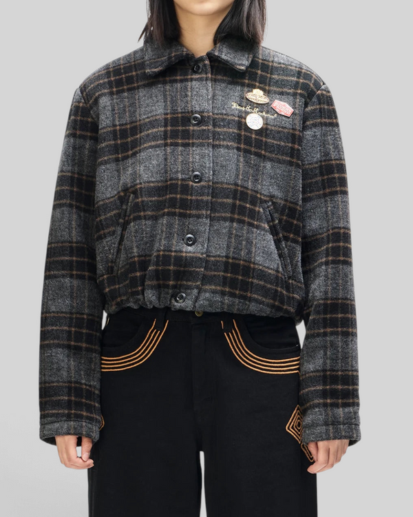 Baffle Haus Lost World wool blend bomber jacket in phantom grey check with custom pins and a drawstring hem.