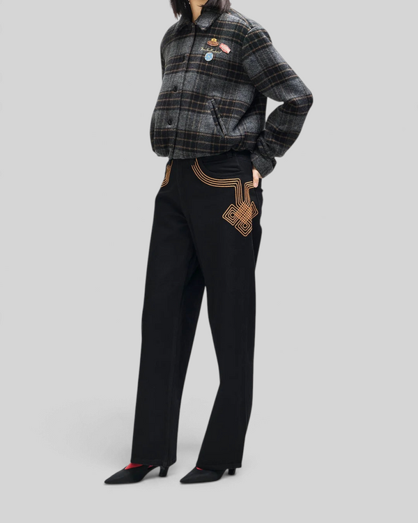 Baffle Haus Lost World wool blend bomber jacket in phantom grey check with custom pins worn by a model
