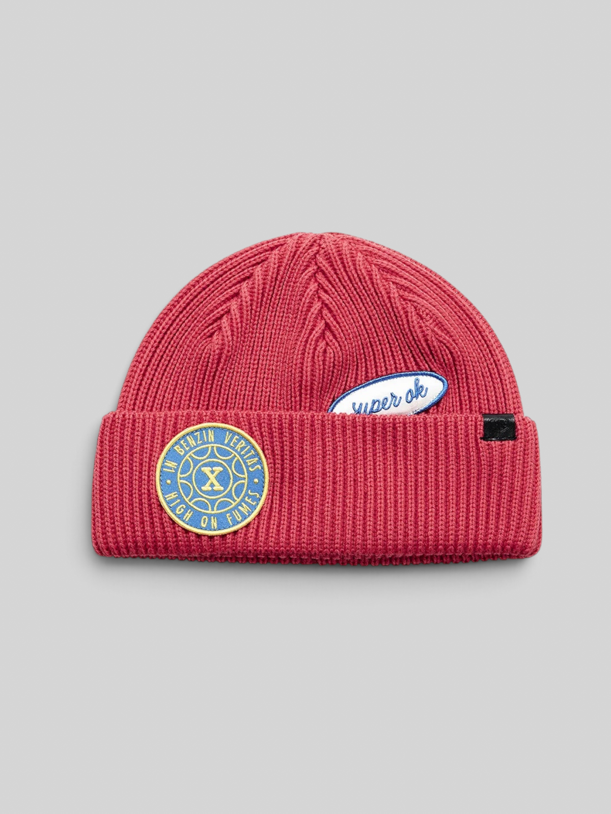 Baffle Haus red merino wool fisherman beanie with Deus Ex Machina chenille and sateen patches