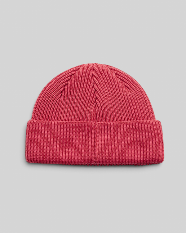 Baffle Haus Trophy Beanie in red merino wool with a fisherman fit and ribbed knit texture